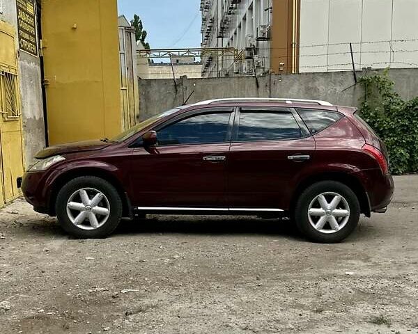 Красный Ниссан Мурано, объемом двигателя 3.5 л и пробегом 210 тыс. км за 7500 $, фото 1 на Automoto.ua