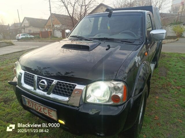 Чорний Ніссан НП, об'ємом двигуна 2 л та пробігом 420 тис. км за 5500 $, фото 1 на Automoto.ua