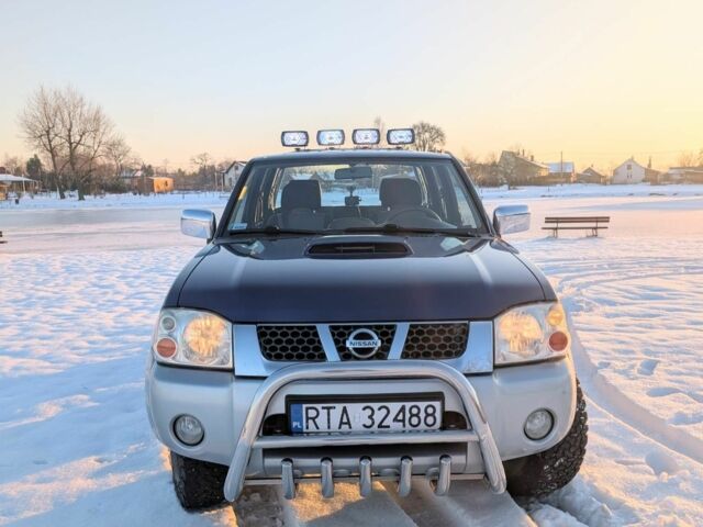 Синий Ниссан НП, объемом двигателя 2.5 л и пробегом 139 тыс. км за 3300 $, фото 1 на Automoto.ua
