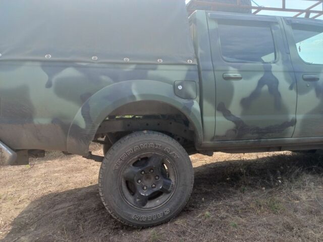 Зелений Ніссан НП, об'ємом двигуна 2.5 л та пробігом 230 тис. км за 6000 $, фото 1 на Automoto.ua