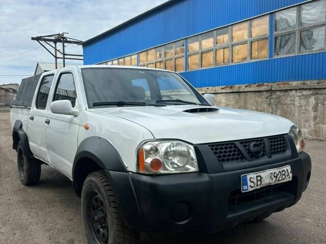 Білий Ніссан Навара, об'ємом двигуна 2.5 л та пробігом 210 тис. км за 4218 $, фото 1 на Automoto.ua