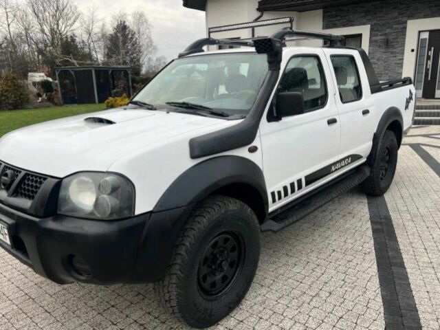 Білий Ніссан Навара, об'ємом двигуна 2.5 л та пробігом 220 тис. км за 2483 $, фото 1 на Automoto.ua