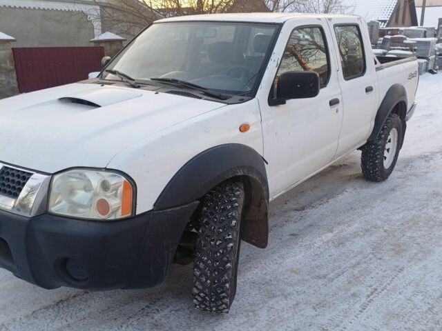 Белый Ниссан Навара, объемом двигателя 0 л и пробегом 200 тыс. км за 5800 $, фото 1 на Automoto.ua