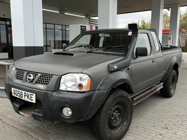 Белый Ниссан Навара, объемом двигателя 2.5 л и пробегом 200 тыс. км за 4200 $, фото 1 на Automoto.ua
