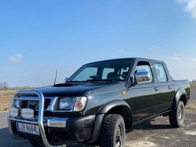 Чорний Ніссан Навара, об'ємом двигуна 2.5 л та пробігом 234 тис. км за 2680 $, фото 1 на Automoto.ua