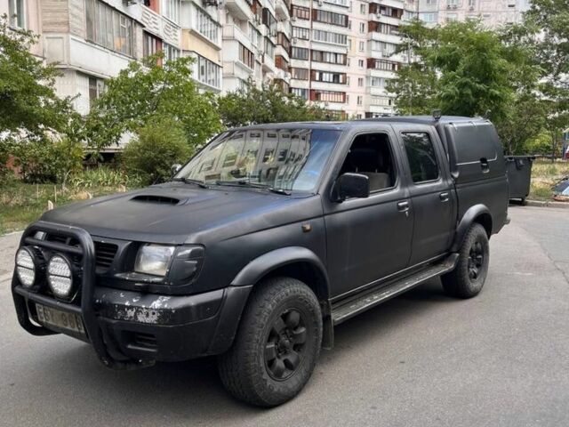 Чорний Ніссан Навара, об'ємом двигуна 2.5 л та пробігом 250 тис. км за 4803 $, фото 1 на Automoto.ua