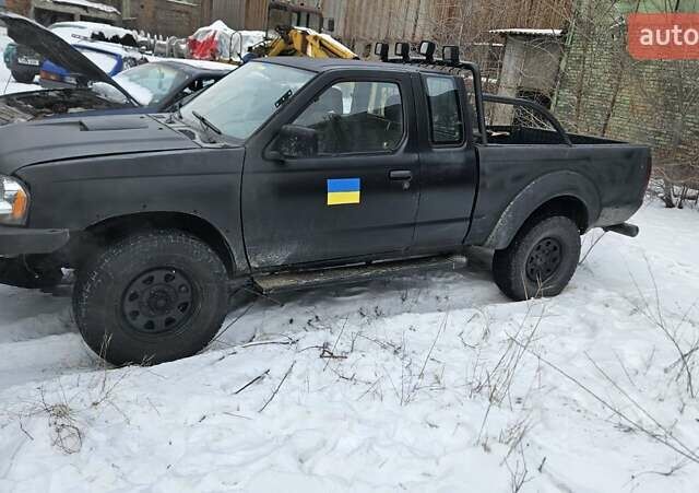 Чорний Ніссан Навара, об'ємом двигуна 2.5 л та пробігом 244 тис. км за 6800 $, фото 1 на Automoto.ua