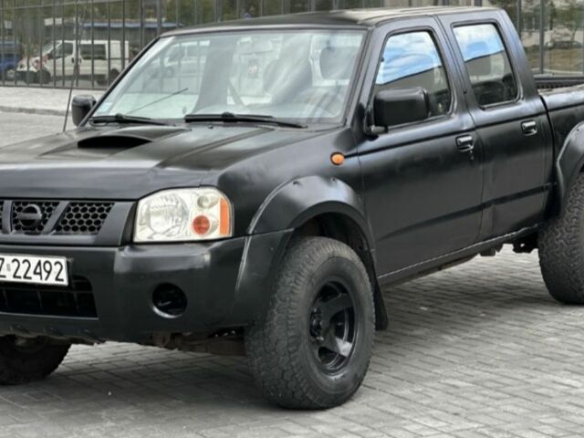 Черный Ниссан Навара, объемом двигателя 0 л и пробегом 290 тыс. км за 5400 $, фото 1 на Automoto.ua
