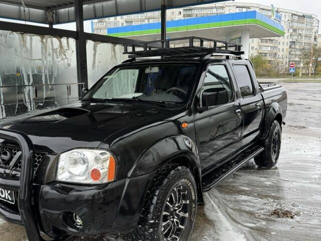 Чорний Ніссан Навара, об'ємом двигуна 2.5 л та пробігом 330 тис. км за 4500 $, фото 1 на Automoto.ua