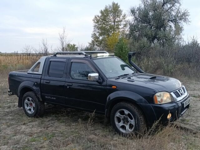 Черный Ниссан Навара, объемом двигателя 2.5 л и пробегом 100 тыс. км за 5300 $, фото 1 на Automoto.ua