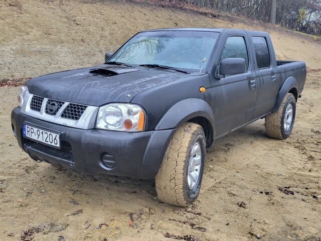 Чорний Ніссан Навара, об'ємом двигуна 2.5 л та пробігом 238 тис. км за 2550 $, фото 1 на Automoto.ua