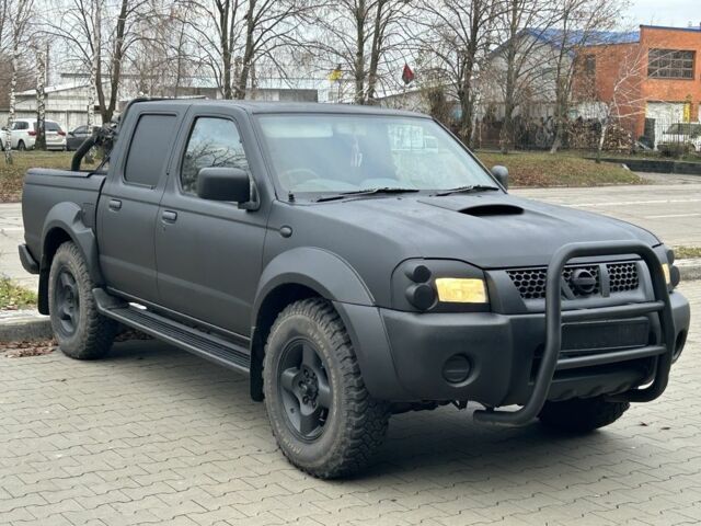 Черный Ниссан Навара, объемом двигателя 2.5 л и пробегом 220 тыс. км за 4250 $, фото 1 на Automoto.ua