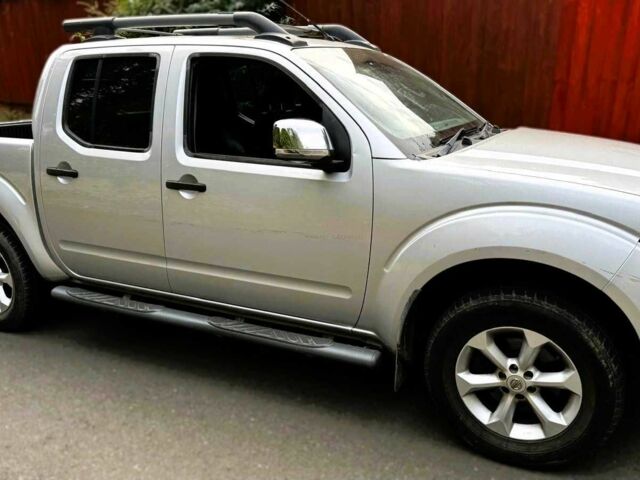 Черный Ниссан Навара, объемом двигателя 2.5 л и пробегом 170 тыс. км за 4900 $, фото 1 на Automoto.ua