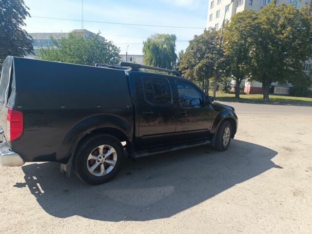 Черный Ниссан Навара, объемом двигателя 2.5 л и пробегом 200 тыс. км за 6100 $, фото 1 на Automoto.ua