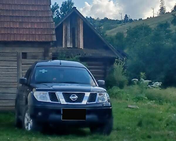 Черный Ниссан Навара, объемом двигателя 2.49 л и пробегом 279 тыс. км за 5800 $, фото 1 на Automoto.ua