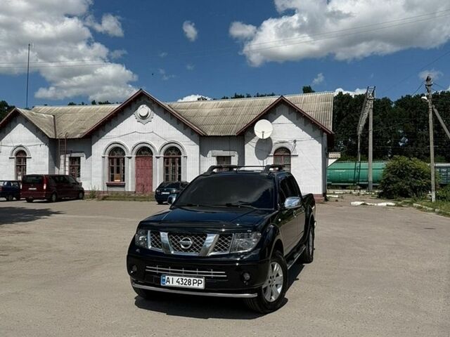 Черный Ниссан Навара, объемом двигателя 2.49 л и пробегом 330 тыс. км за 13000 $, фото 1 на Automoto.ua