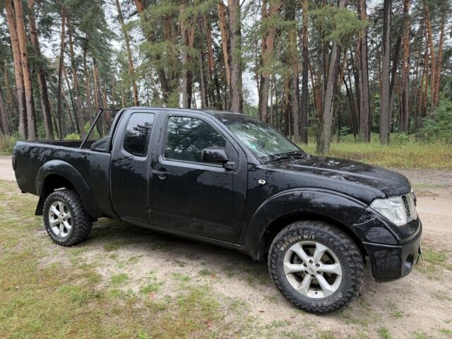 Черный Ниссан Навара, объемом двигателя 2.5 л и пробегом 275 тыс. км за 4250 $, фото 1 на Automoto.ua