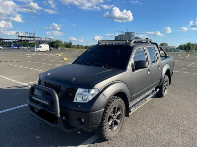 Черный Ниссан Навара, объемом двигателя 2.5 л и пробегом 270 тыс. км за 17200 $, фото 1 на Automoto.ua