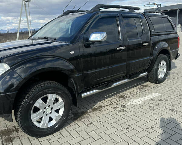 Черный Ниссан Навара, объемом двигателя 2.5 л и пробегом 180 тыс. км за 13200 $, фото 1 на Automoto.ua