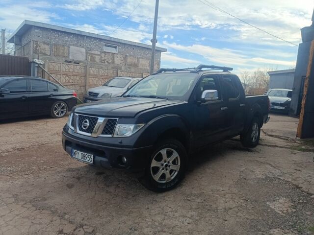 Черный Ниссан Навара, объемом двигателя 2.5 л и пробегом 300 тыс. км за 2800 $, фото 1 на Automoto.ua