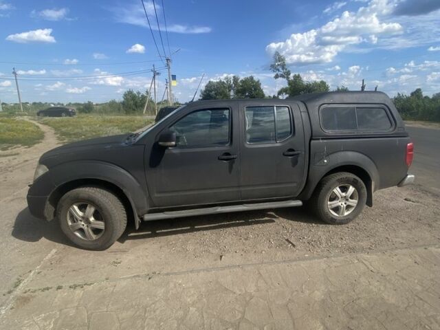 Черный Ниссан Навара, объемом двигателя 2.5 л и пробегом 240 тыс. км за 5700 $, фото 1 на Automoto.ua