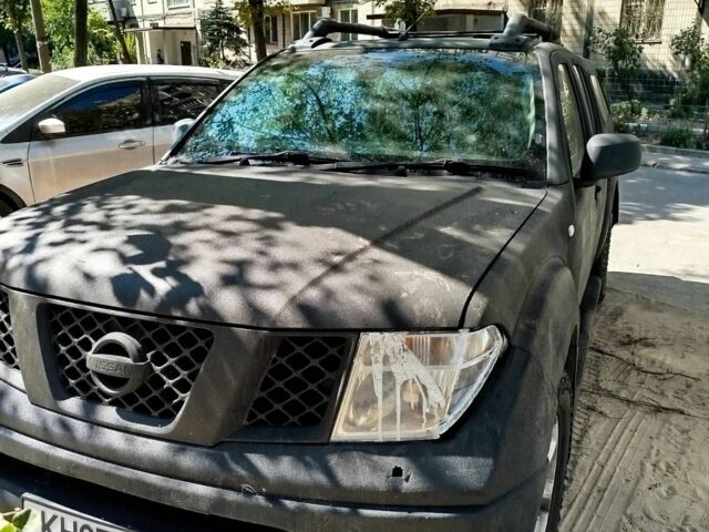 Черный Ниссан Навара, объемом двигателя 2.5 л и пробегом 125 тыс. км за 5100 $, фото 1 на Automoto.ua