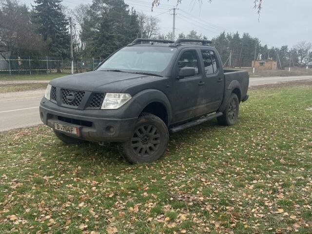 Черный Ниссан Навара, объемом двигателя 2.5 л и пробегом 239 тыс. км за 4700 $, фото 1 на Automoto.ua