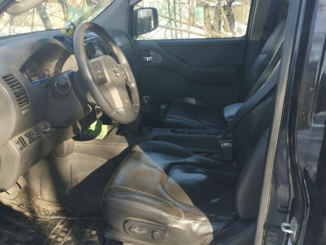 Черный Ниссан Навара, объемом двигателя 0 л и пробегом 250 тыс. км за 7699 $, фото 1 на Automoto.ua