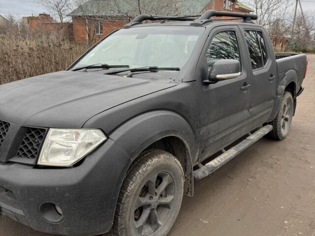 Черный Ниссан Навара, объемом двигателя 2.5 л и пробегом 240 тыс. км за 4000 $, фото 1 на Automoto.ua