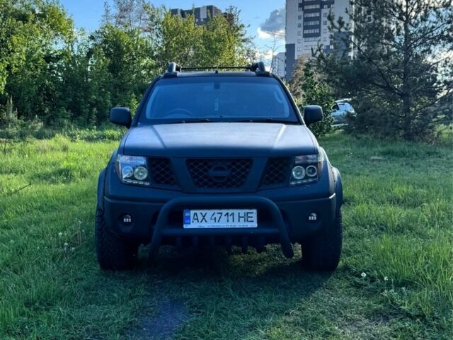 Черный Ниссан Навара, объемом двигателя 2.5 л и пробегом 200 тыс. км за 6100 $, фото 1 на Automoto.ua
