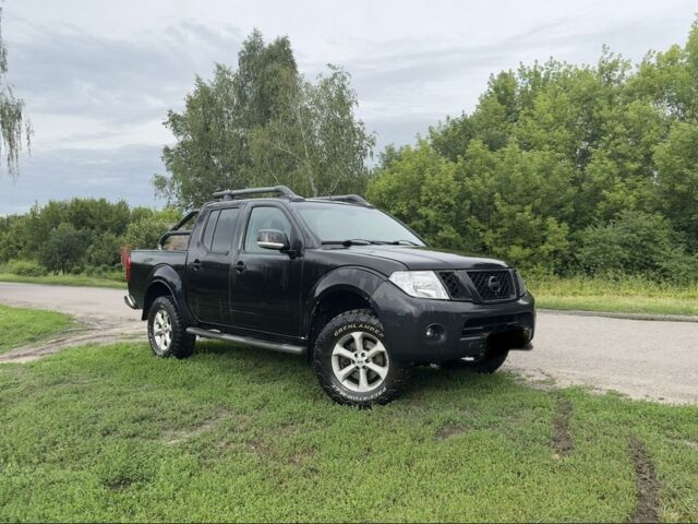 Черный Ниссан Навара, объемом двигателя 2.5 л и пробегом 270 тыс. км за 7000 $, фото 1 на Automoto.ua