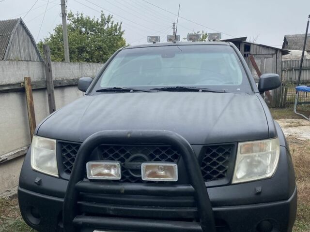 Черный Ниссан Навара, объемом двигателя 2.5 л и пробегом 314 тыс. км за 4950 $, фото 1 на Automoto.ua
