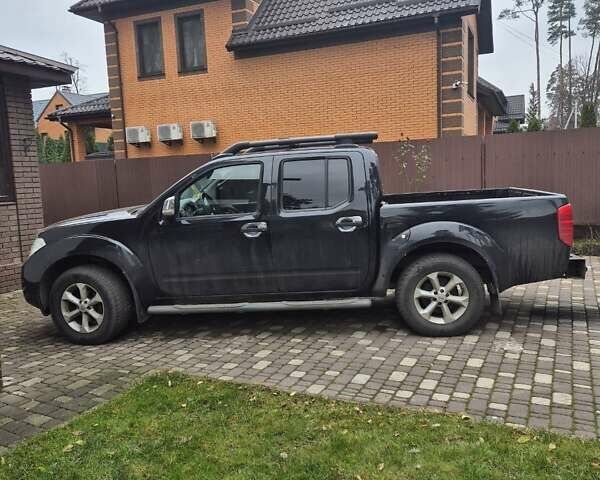 Черный Ниссан Навара, объемом двигателя 2.49 л и пробегом 150 тыс. км за 12500 $, фото 1 на Automoto.ua