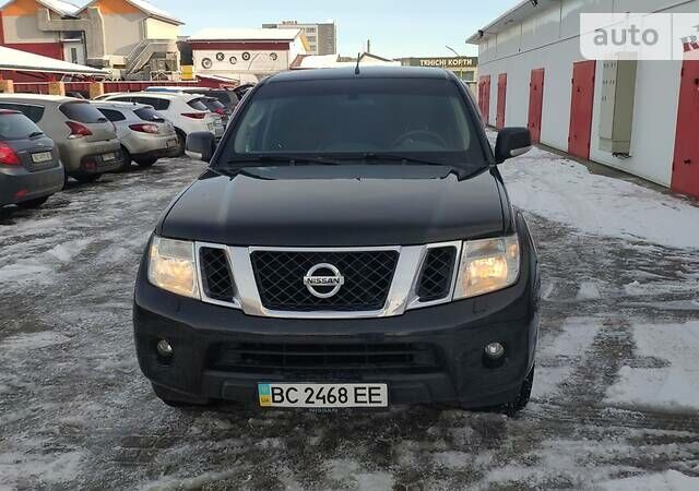 Черный Ниссан Навара, объемом двигателя 2.5 л и пробегом 320 тыс. км за 17300 $, фото 1 на Automoto.ua