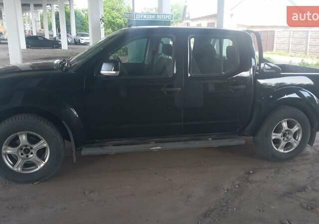 Чорний Ніссан Навара, об'ємом двигуна 2.5 л та пробігом 255 тис. км за 8697 $, фото 1 на Automoto.ua