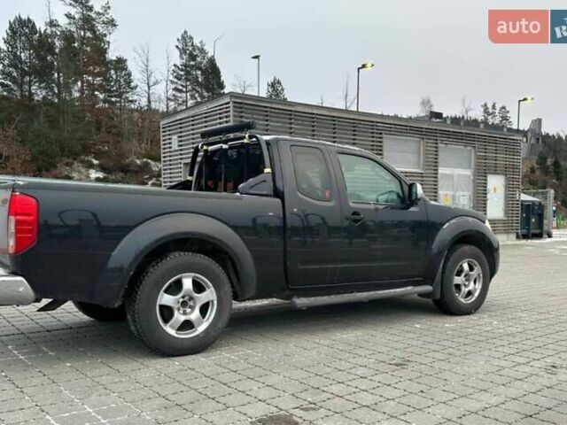 Черный Ниссан Навара, объемом двигателя 2.49 л и пробегом 200 тыс. км за 7911 $, фото 1 на Automoto.ua