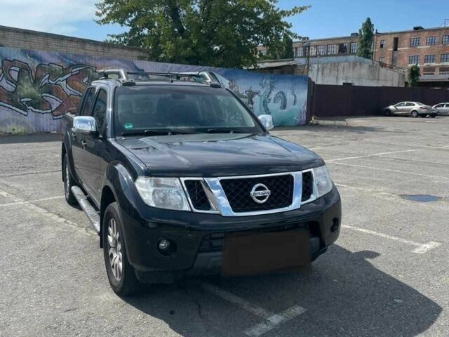 Черный Ниссан Навара, объемом двигателя 3 л и пробегом 153 тыс. км за 12896 $, фото 1 на Automoto.ua
