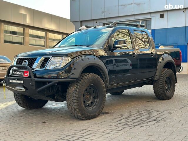 Черный Ниссан Навара, объемом двигателя 2.5 л и пробегом 95 тыс. км за 23290 $, фото 1 на Automoto.ua