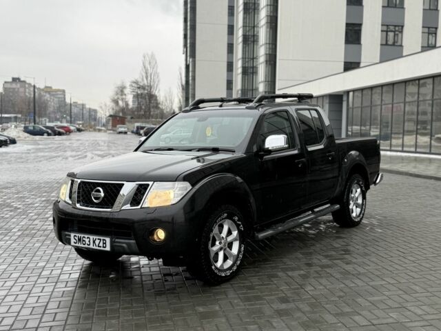 Черный Ниссан Навара, объемом двигателя 2.5 л и пробегом 124 тыс. км за 5999 $, фото 1 на Automoto.ua