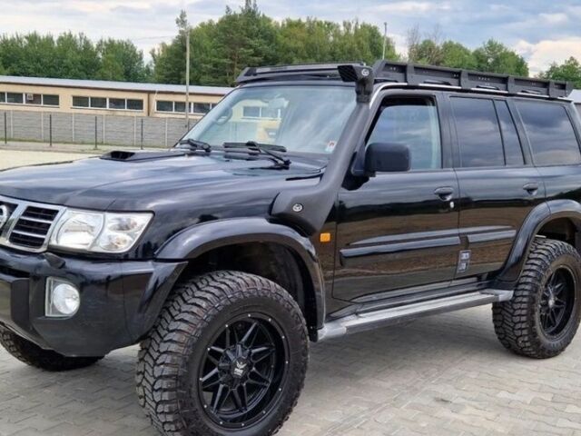 Чорний Ніссан Навара, об'ємом двигуна 3 л та пробігом 234 тис. км за 4400 $, фото 1 на Automoto.ua