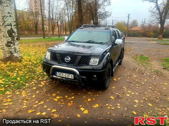 Черный Ниссан Навара, объемом двигателя 2.5 л и пробегом 260 тыс. км за 9500 $, фото 1 на Automoto.ua
