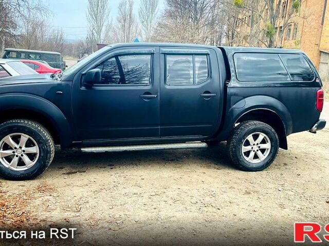 Черный Ниссан Навара, объемом двигателя 2.5 л и пробегом 370 тыс. км за 8000 $, фото 1 на Automoto.ua