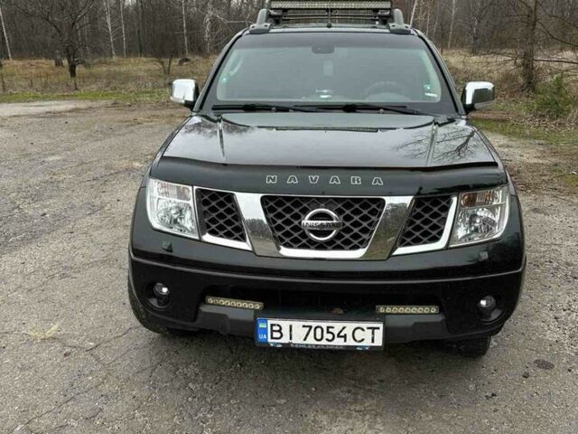 Черный Ниссан Навара, объемом двигателя 2.5 л и пробегом 238 тыс. км за 13000 $, фото 1 на Automoto.ua