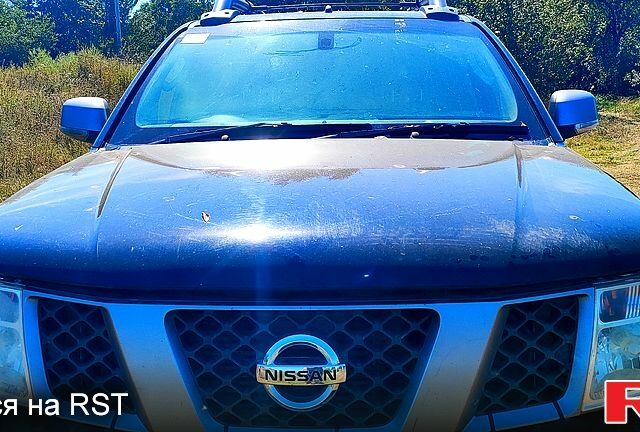 Ниссан Навара 2009 в Изюме на Automoto.ua Черный Ниссан Навара, объемом двигателя 2.5 л и пробегом 212 тыс. км за 5500 $, фото 1 на Automoto.ua