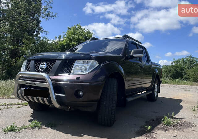 Фіолетовий Ніссан Навара, об'ємом двигуна 2.49 л та пробігом 230 тис. км за 11500 $, фото 1 на Automoto.ua