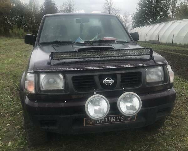 Коричневый Ниссан Навара, объемом двигателя 2.49 л и пробегом 290 тыс. км за 3786 $, фото 1 на Automoto.ua