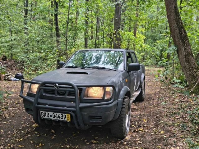 Сірий Ніссан Навара, об'ємом двигуна 2.5 л та пробігом 150 тис. км за 4853 $, фото 1 на Automoto.ua