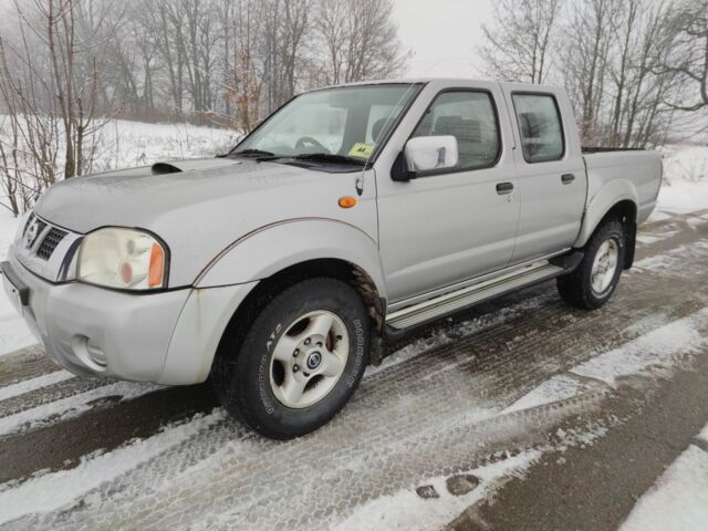 Серый Ниссан Навара, объемом двигателя 2.5 л и пробегом 160 тыс. км за 4653 $, фото 1 на Automoto.ua