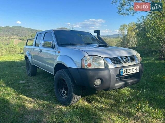 Серый Ниссан Навара, объемом двигателя 2.49 л и пробегом 345 тыс. км за 6200 $, фото 1 на Automoto.ua