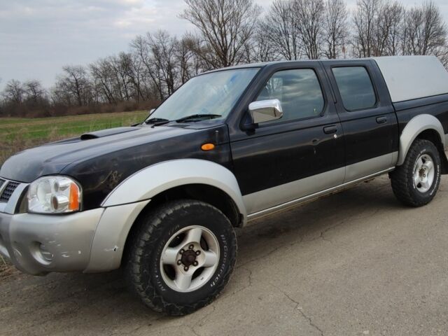 Сірий Ніссан Навара, об'ємом двигуна 2.5 л та пробігом 140 тис. км за 4900 $, фото 1 на Automoto.ua